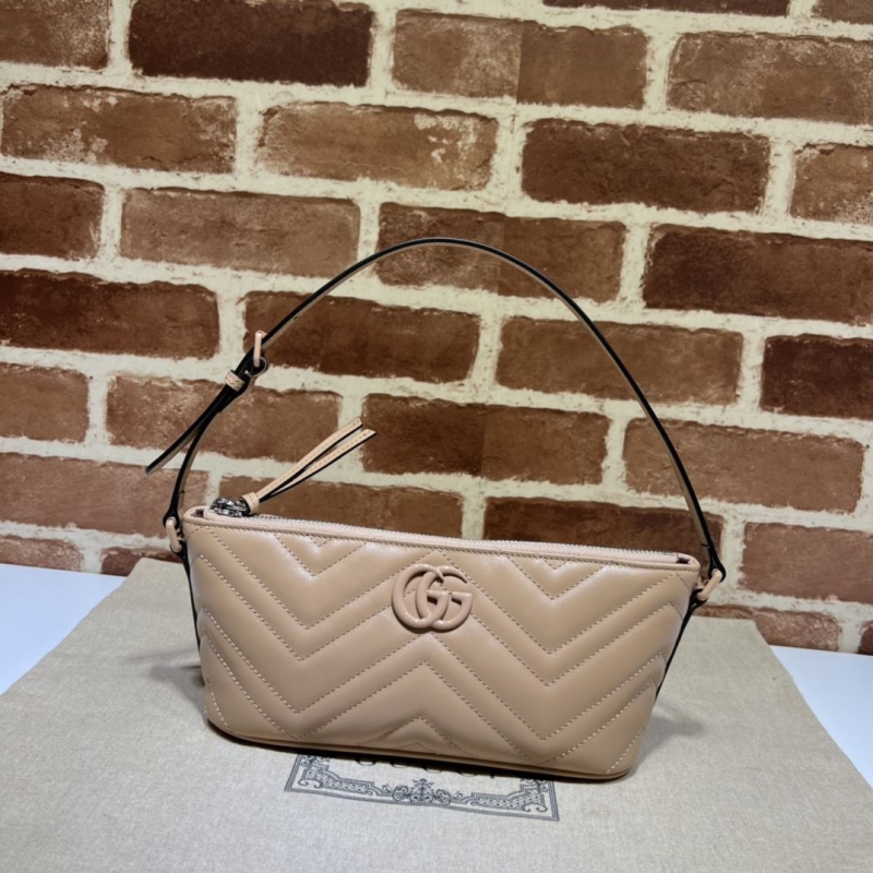 G*u*i top handle bags
